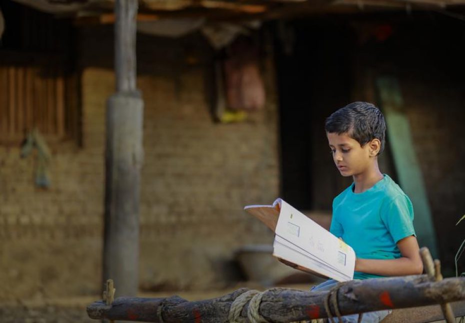 poor-child-studying-home